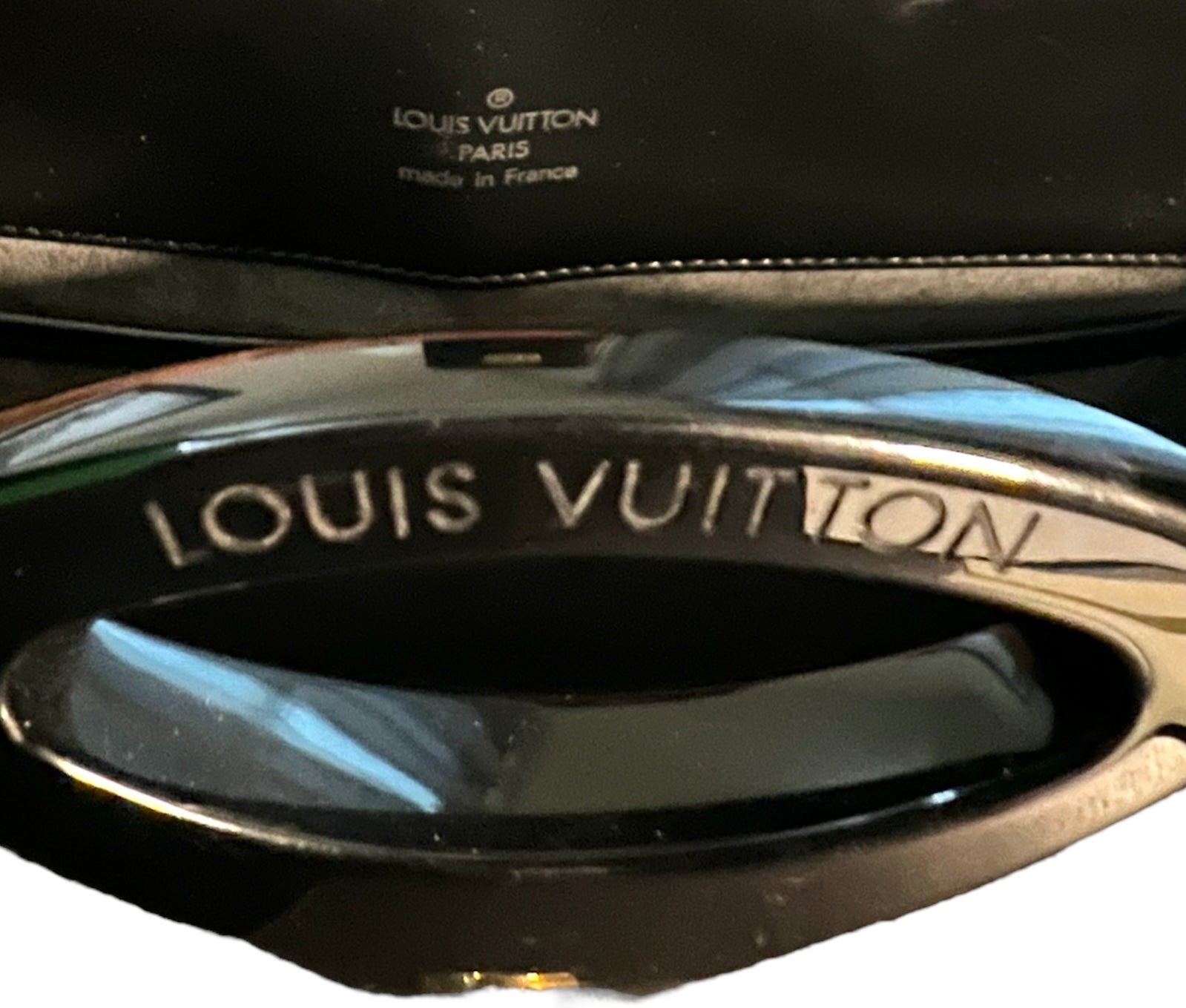 Louis Vuitton Black Epi Leather Reverie Bag For Sale at 1stDibs  louis  vuitton reverie bag, louis vuitton epi reverie, louis vuitton motorcycle  seat